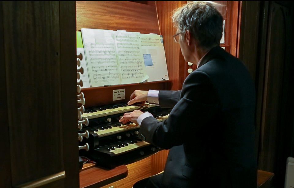 Alistair Warwick playing the organ at Holy Trinity Church, Stirling